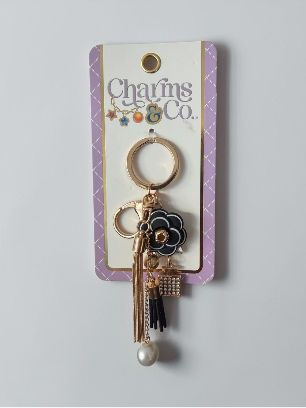 Charms & Co. Gold-Tone Black Flower Keychain Bag Charm